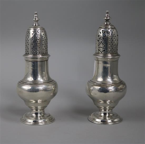 A pair of George II silver sugar casters by Samuel Wood, London, 1744, 14.8cm.